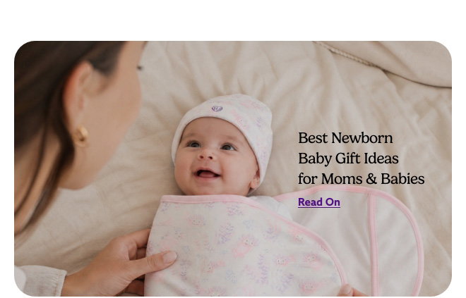 Image of a baby wearing a Pink Axolotl Swaddle & Beanie Gift Set. ReadBest Newborn Baby Gift Ideas for Moms & Babies.