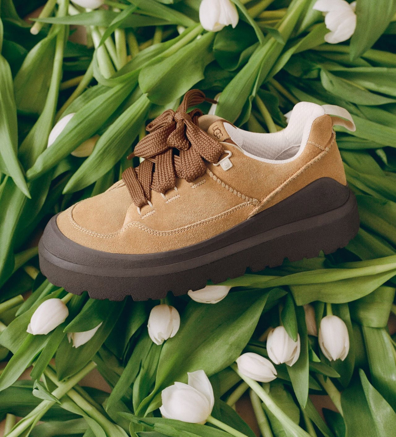 The Heritage Utility Sneaker Knoll layed out on tuilips.