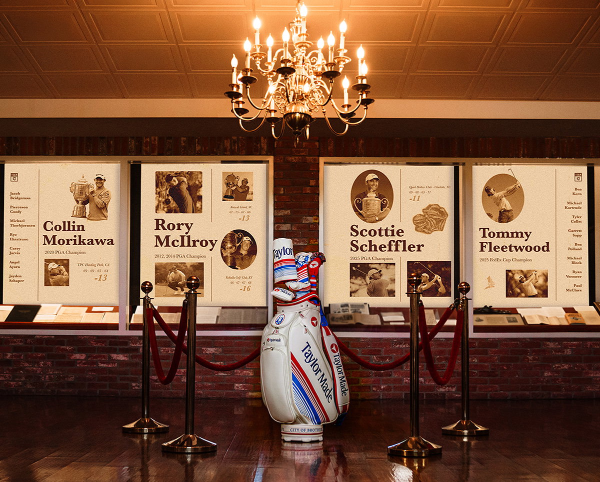 Liberty Lines Staff Bag and Headcover Set in front of a display of Team TaylorMade successes at the Professional Championship