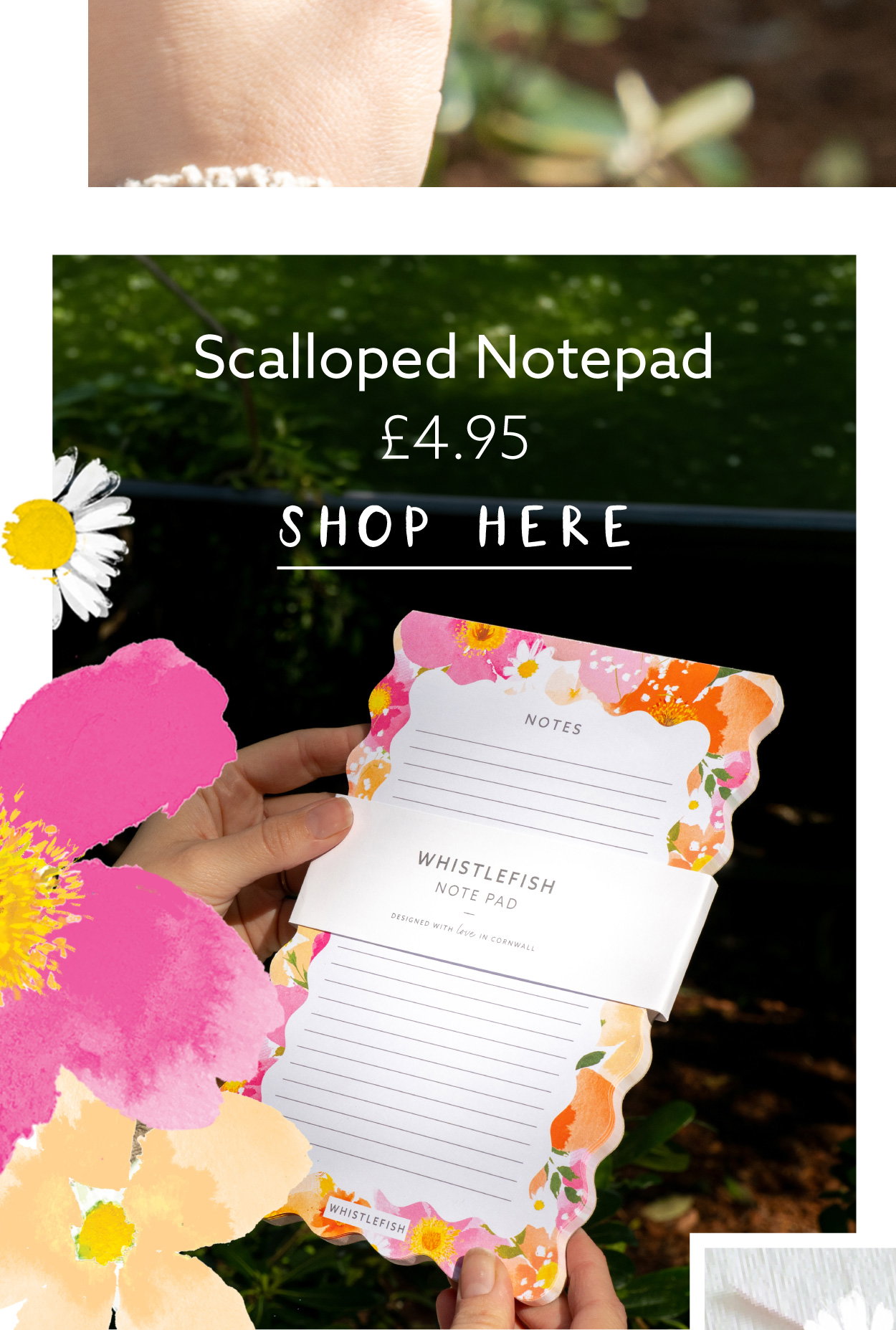Petal Pop scalloped notepad with floral border design held outdoors in sunlight. Decorative lined notepad designed for lists, reminders and everyday notes.