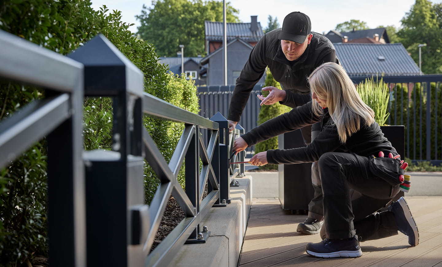 Couple using workwear for the jobs at home