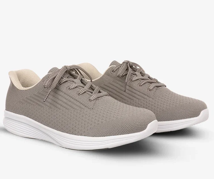 The Soho 1996 is inspired by a vintage running model, bringing classic flair to contemporary style.