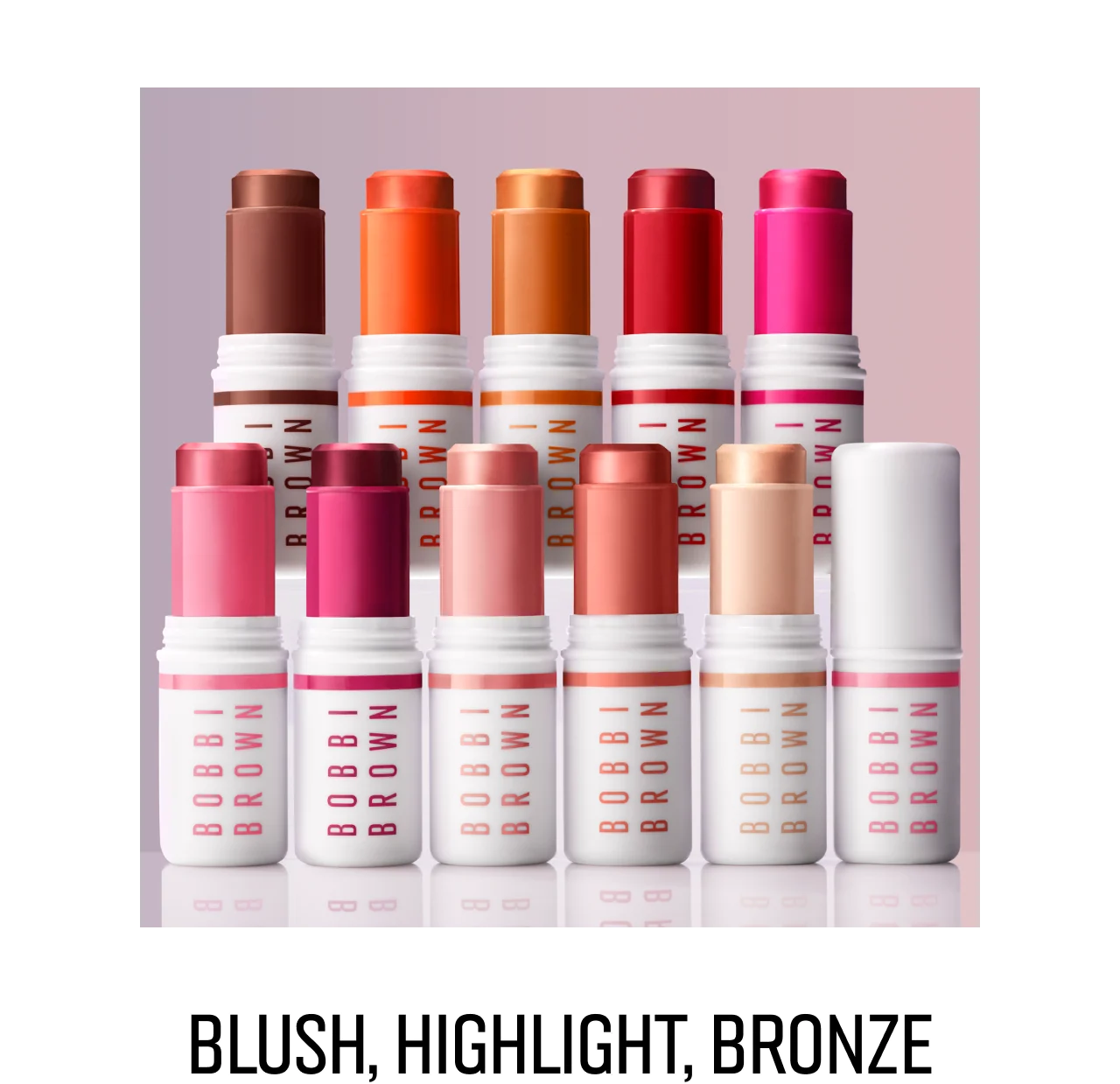Tubes of Skin Enhancer Multi-Stick in ten different shades, arranged in two rows, with text below 'Blush, Highlight, Bronze'.