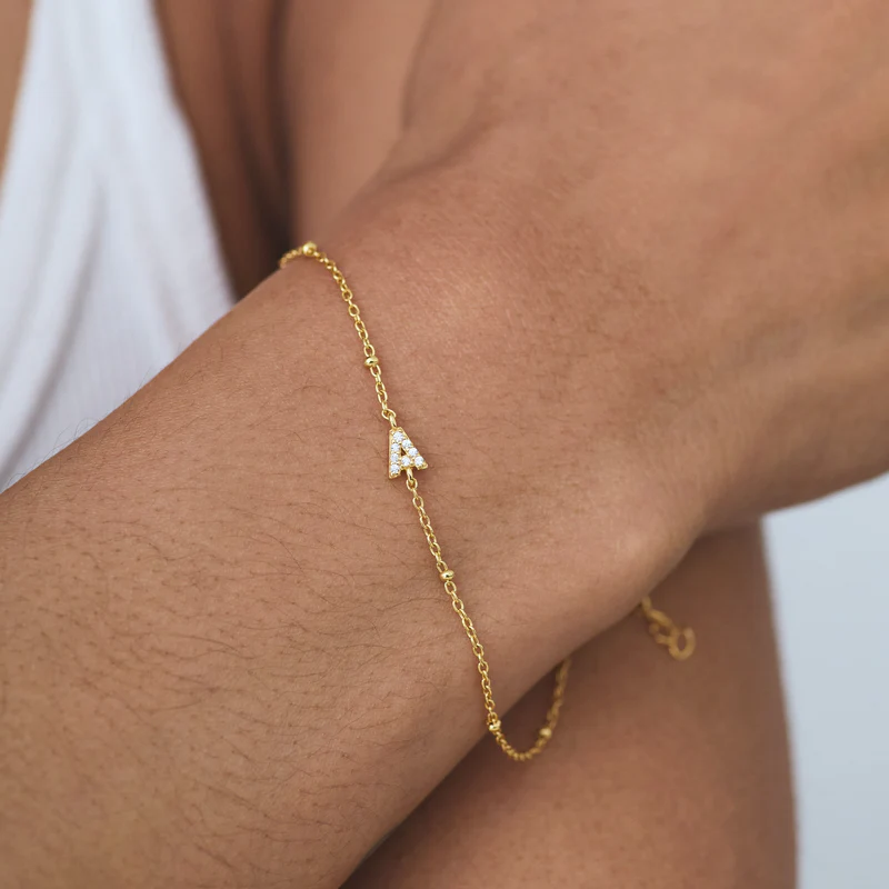 A sweet, wearable gift she'll love from day one, the Petite Initial Bracelet is one of our most-loved pieces.