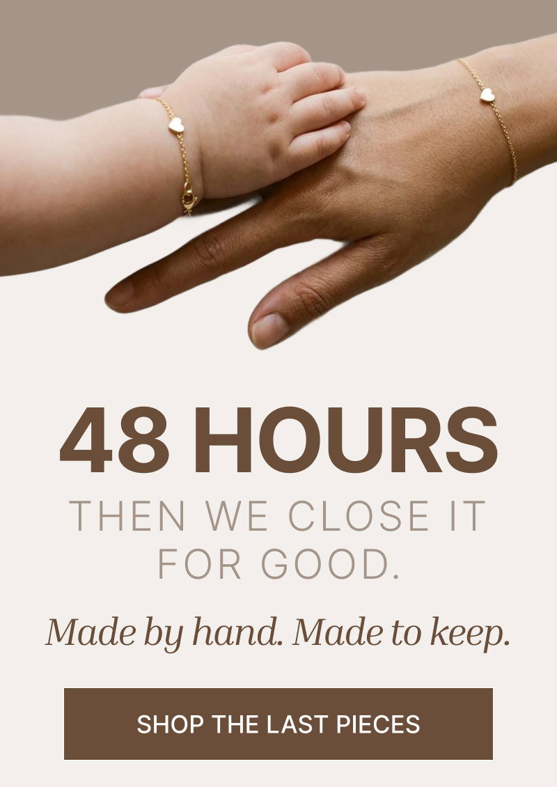 Close-up of two hands touching gently above large centered timing text and a rectangular button on a light background