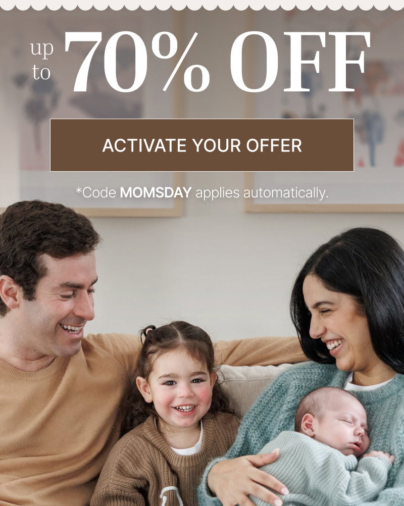 Family sitting together on a couch holding a baby, shown beneath large percentage offer text and a rectangular button