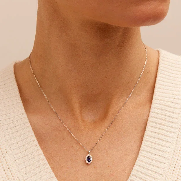 0.13tw Lab-Grown Diamond Oval Created Sapphire Halo Pendant Necklace in Sterling Silver and Platinum