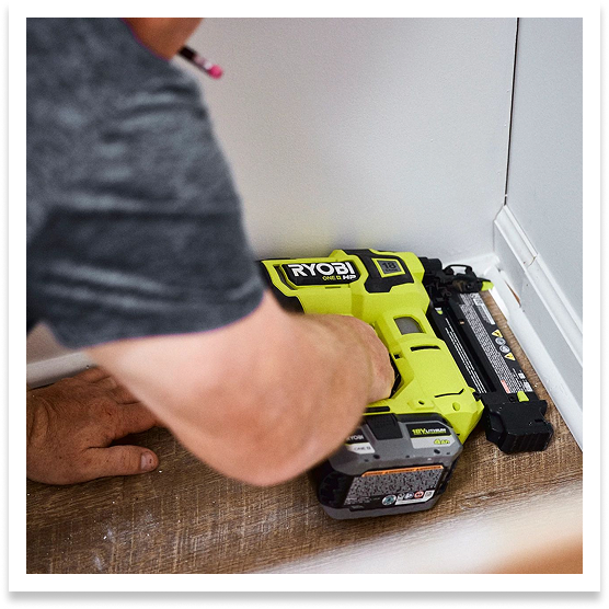 RYOBI nailer being used to install quarter round
