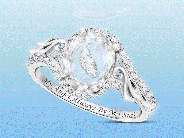 An image of an 8-carat bereavement ring with feathers falling in the background.