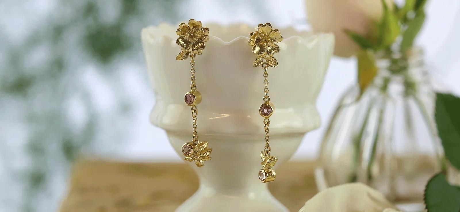 Assymetrical Drop Earrings with a Bee, Dog Rose flowers a with Madagascan Sapphires