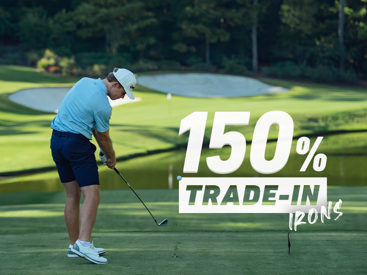 Golfer swinging an iron outdoors on course, with the text '150% trade-in irons' in white over the image