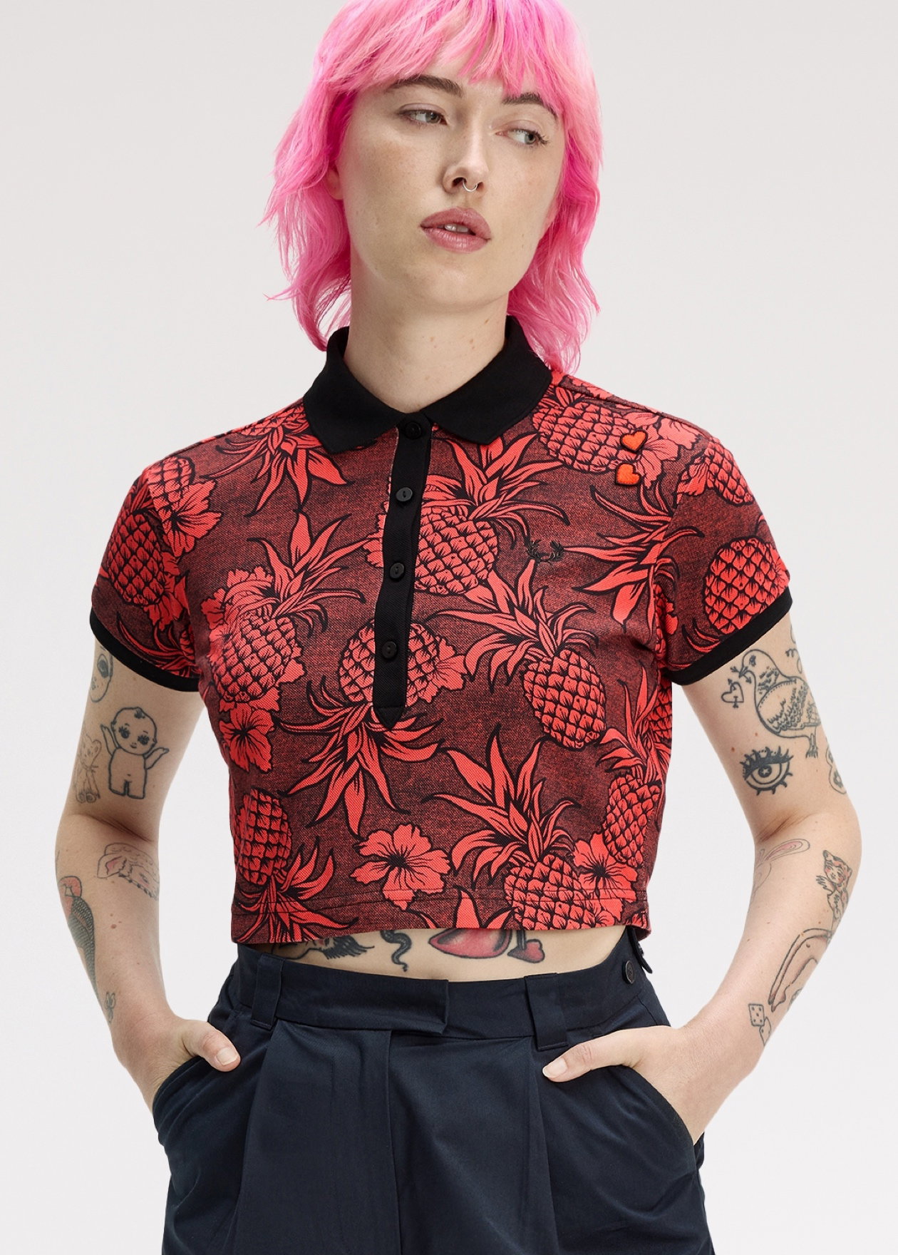 Female model wearing a Fred Perry x Amy Winehouse Foundation Printed Polo Shirt