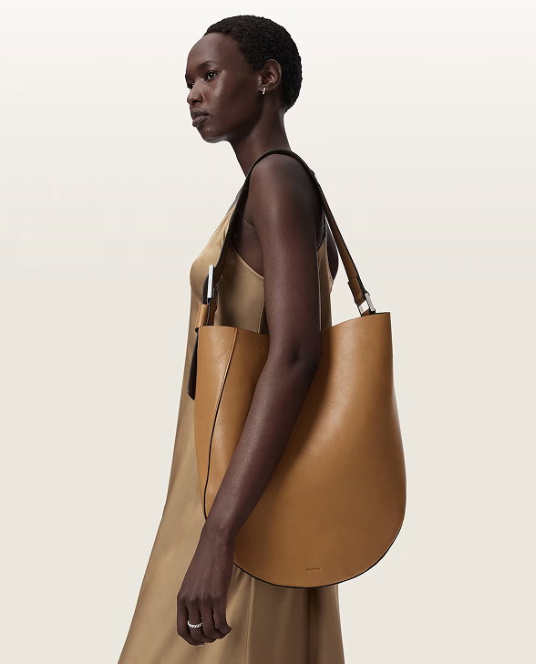 MODEL WITH TAN BAG