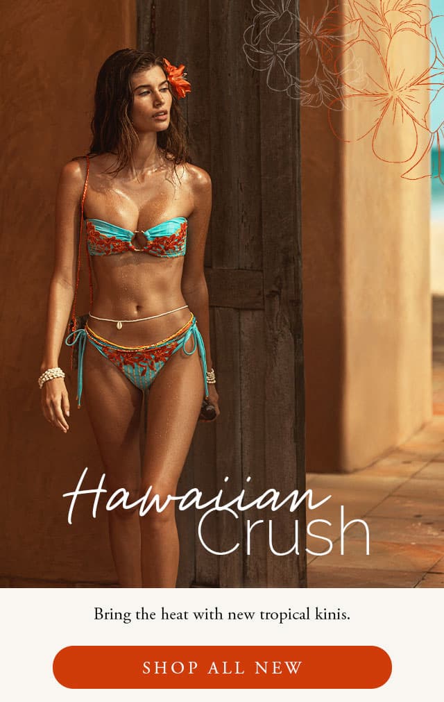 Model wearing a blue and orange bikini with an orange flower in her hair. Shop new arrivals. 