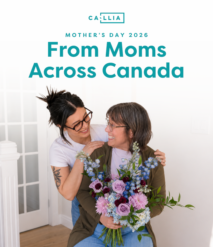 Mom and daughter hugging with a Callia bouquet