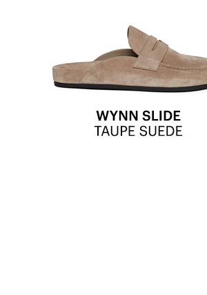 An image of a taupe suede loafer slide