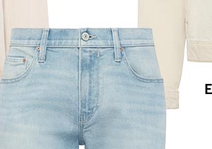 A partial slice of light wash denim jeans