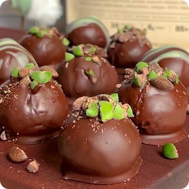 image of chocolate mint brownie truffles on a cutting board
