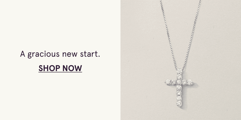 A white metal diamond cross pendant.  A gracious new start. Click here to shop now