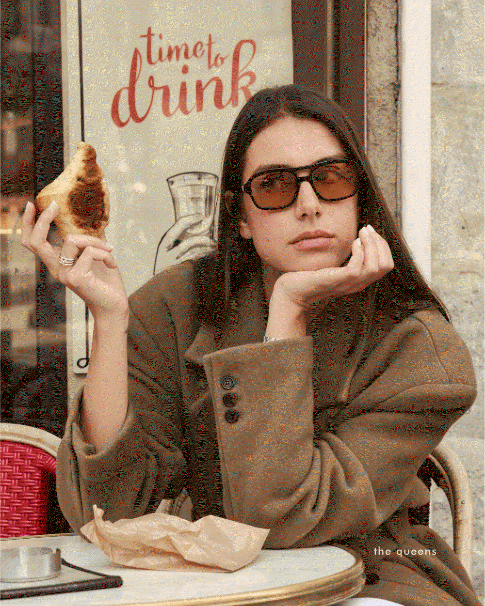 GIF: lifestyle imagery of two women. They are is wearing black aviator sunglasses with light tinted lenses.