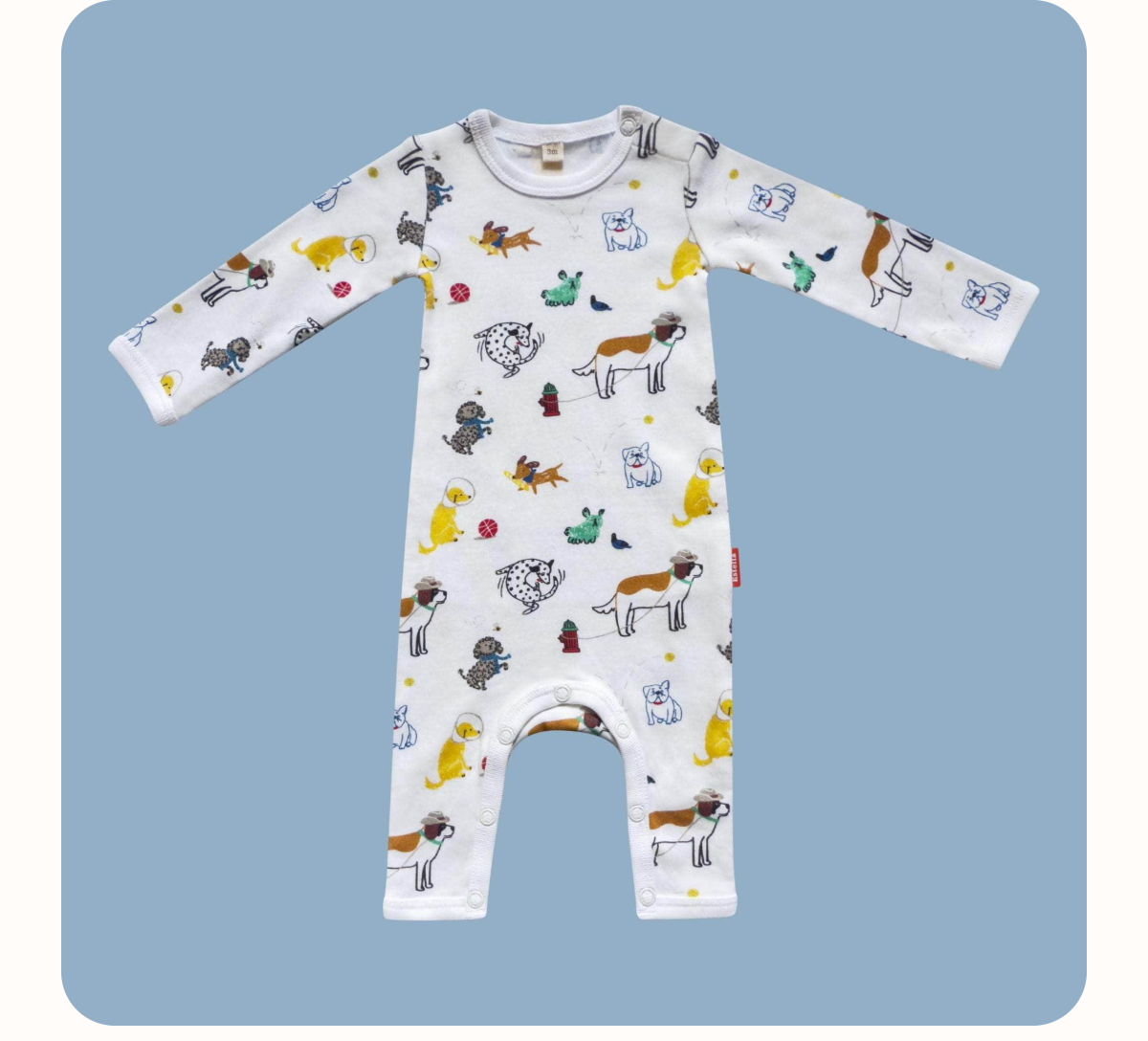 Close-up of the dog print organic romper from the Cuddle Me Gift Set