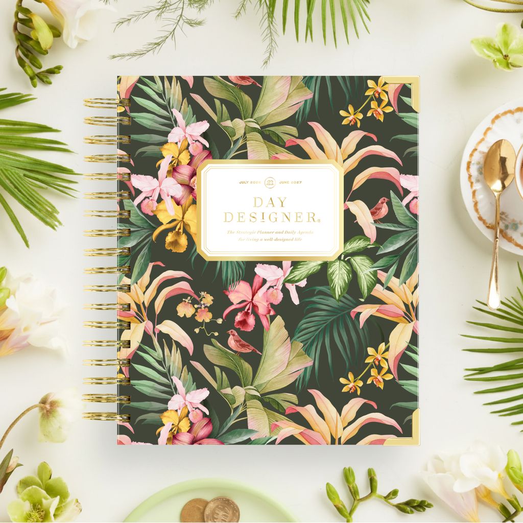 green day designer planner with tropical pattern, gold binding and spoon, dish, palm leaves, beige background