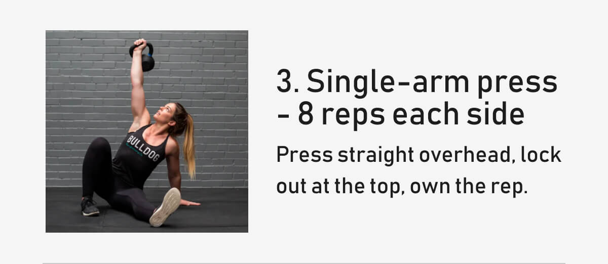 3. Single-arm press - 8 reps each side Press straight overhead, lock out at the top, own the rep.