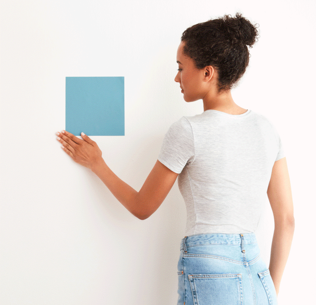 Applying Peel-and-Stick Swatch to the wall