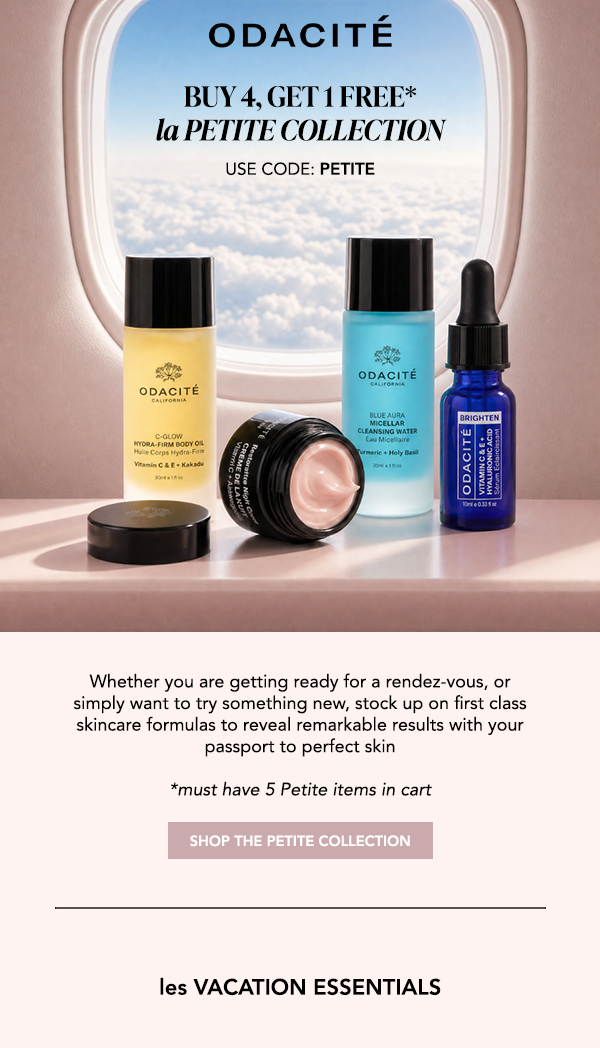Odacité la Petite Collection travel-size skincare products — C-Glow Hydra-Firm Body Oil, Restorative Night Cream, Blue Aura Cleansing Water, and Vitamin C & E Brightening Serum — displayed on a shelf in front of an airplane window with clouds in the background