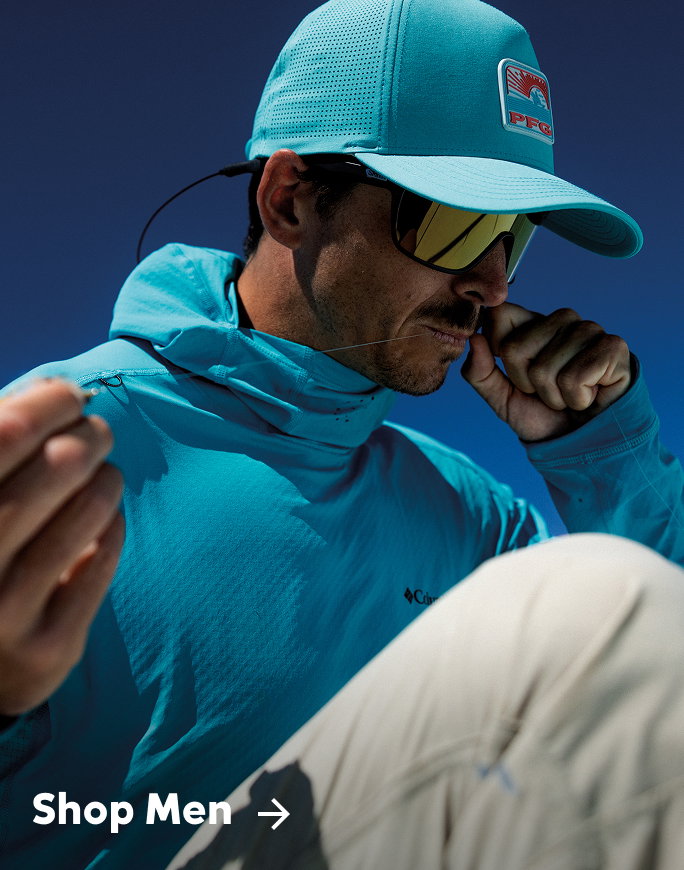 A man tying a fishing line.
