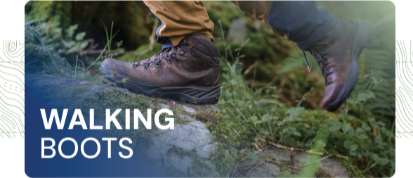 WALKING BOOTS. A man walks on the trail wearing Scarpa Men's Terra GORE-TEX Walking Boots in Brown. 