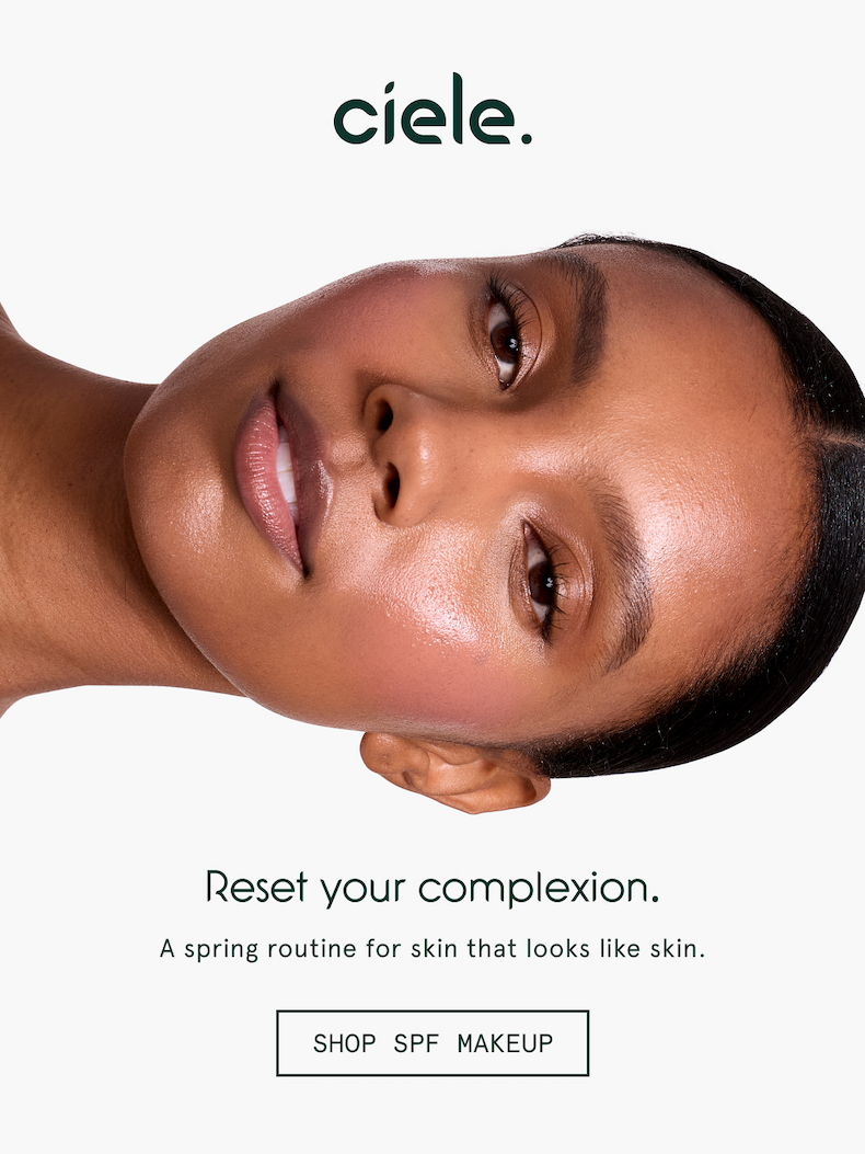 Model wearing makeup that is formulated with SPF