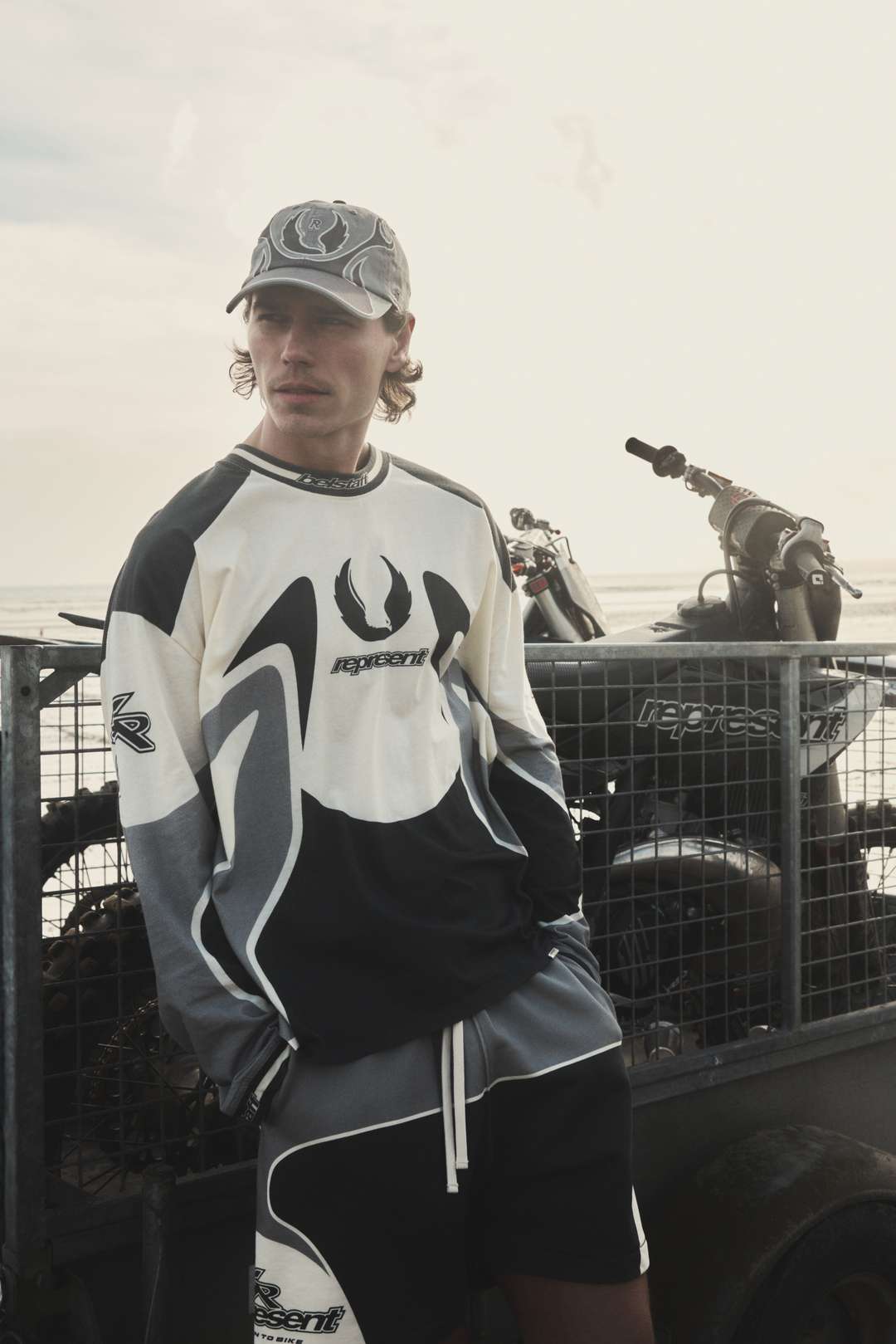 Model wearing the Represent x Belstaff Long Sleeve Racing T-Shirt
