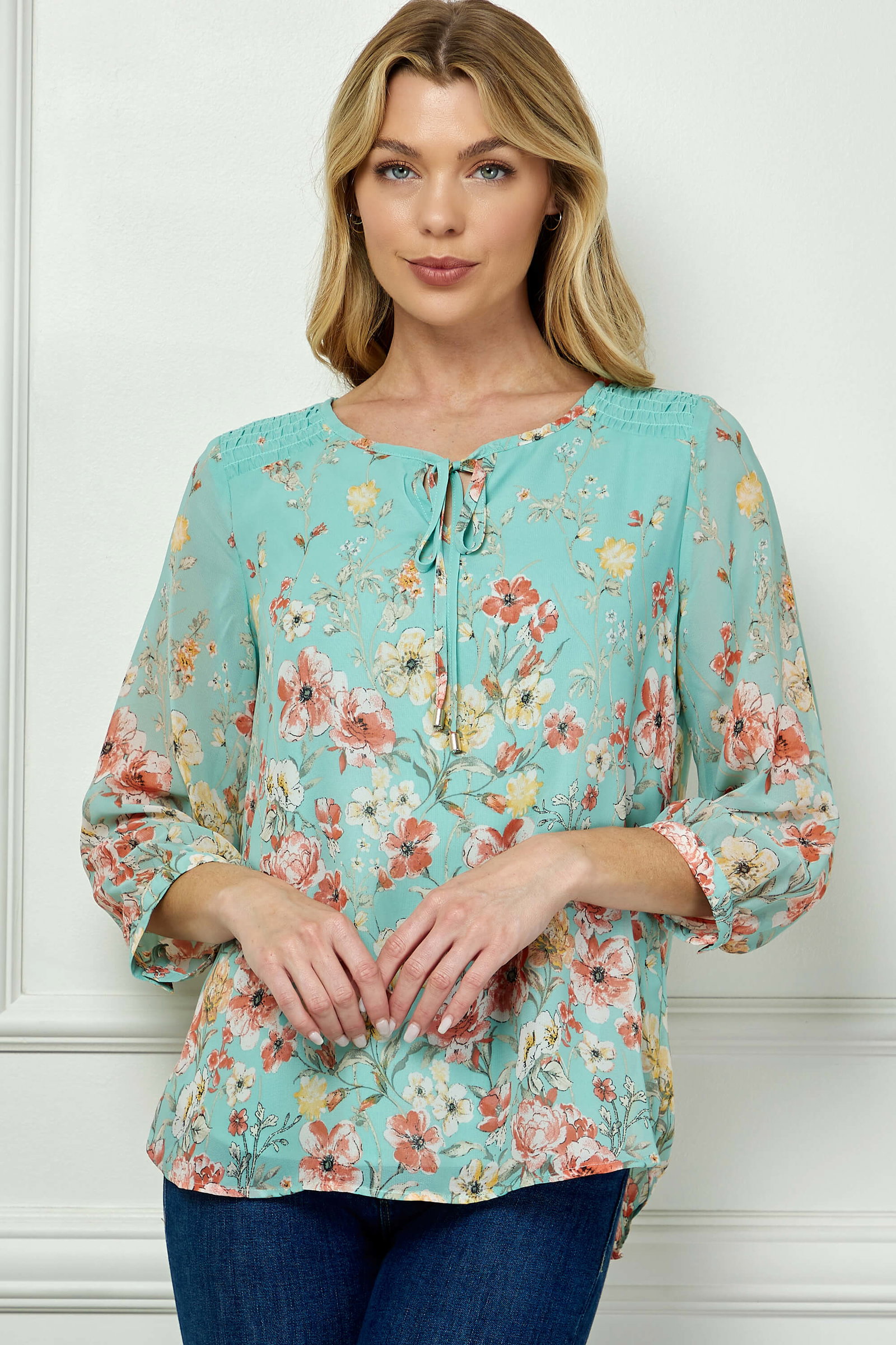 Image of 3/4 Button Cuff Smock Shoulder Tie Neck Border Print Blouse in Seafoam Petals