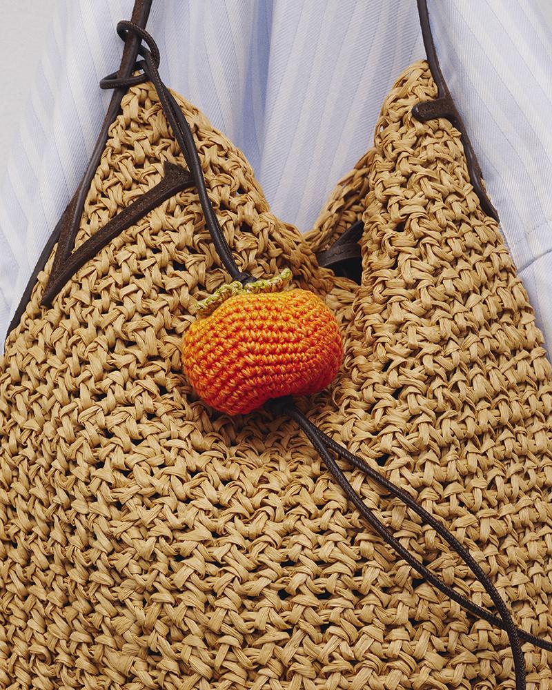 Hand-crocheted persimmon charm