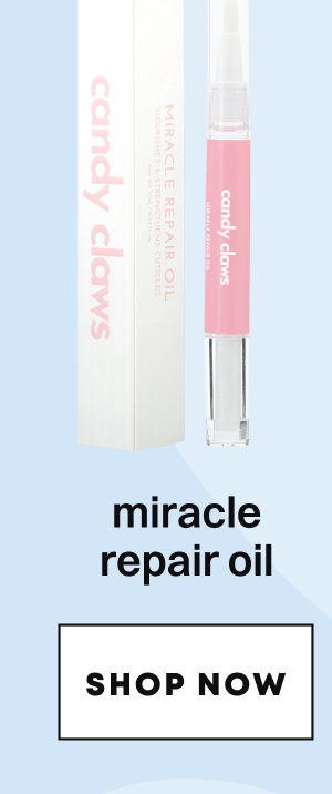 Pink miracle repair oil product in clear tube with applicator and shop button