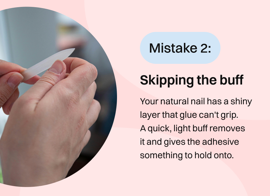 Hands being buffed with nail file, explaining importance of removing shiny nail layer
