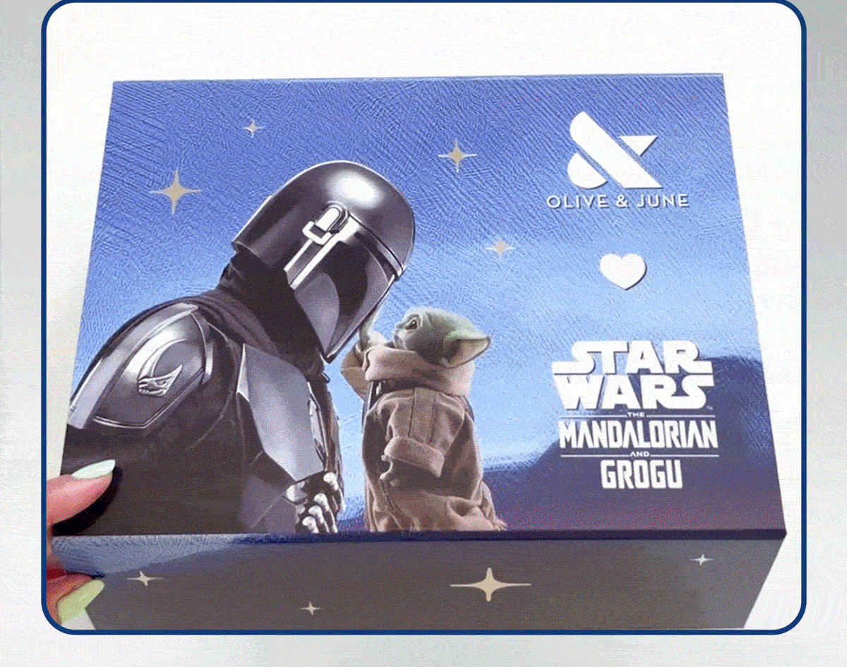 (GIF OF THE LIMITED EDITION MANI SYSTEM OPENING) ALMOST SOLD OUT! THE LIMITED EDITION STAR WARS: THE MANDALORIAN AND GROGU POLISH AND GEL MANI SYSTEMS ARE SELLING FASTER THAN HYPERSPACE | SHOP NOW