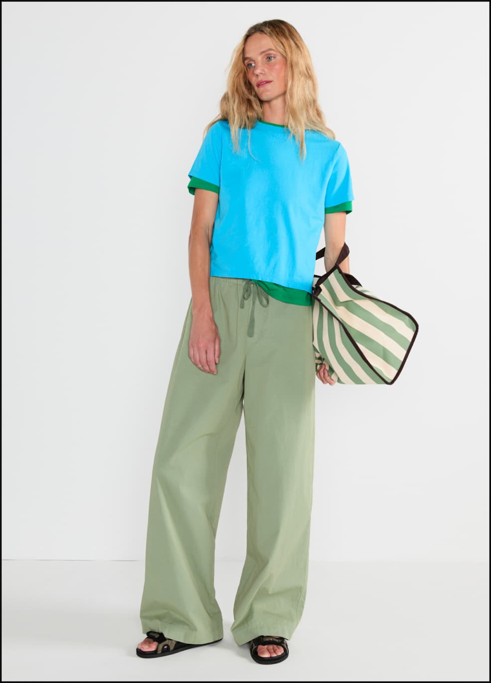 Model wearing the Wynn and Modern tees