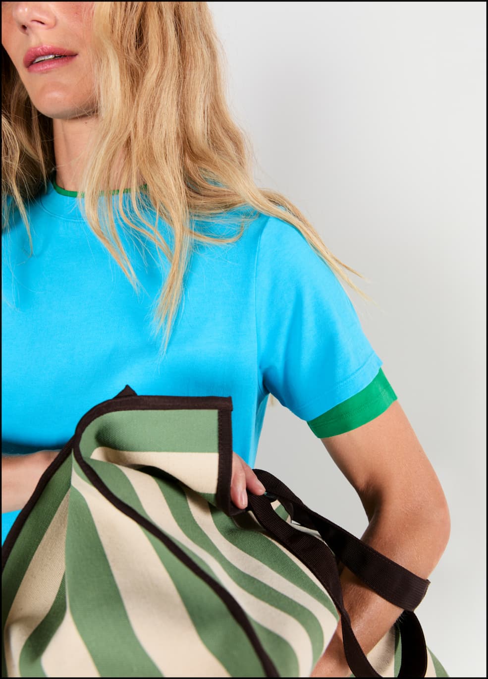 Model wearing the Wynn and Modern tees