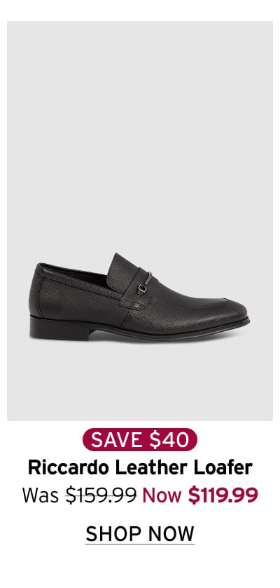 Chocolate brown textured leather loafers with slip-on design, rounded toe, low stacked sole, and refined casual formal styling.