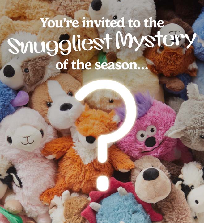 A pile of Warmies with a question mark overlay. Shop Mystery Gift.
