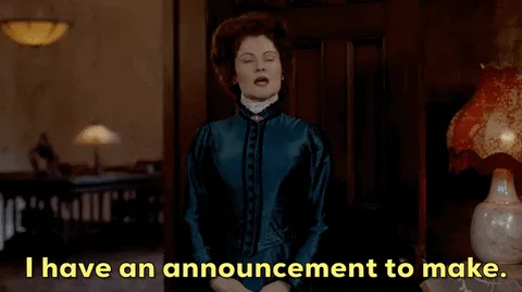 A woman saying I have an announcement to make.