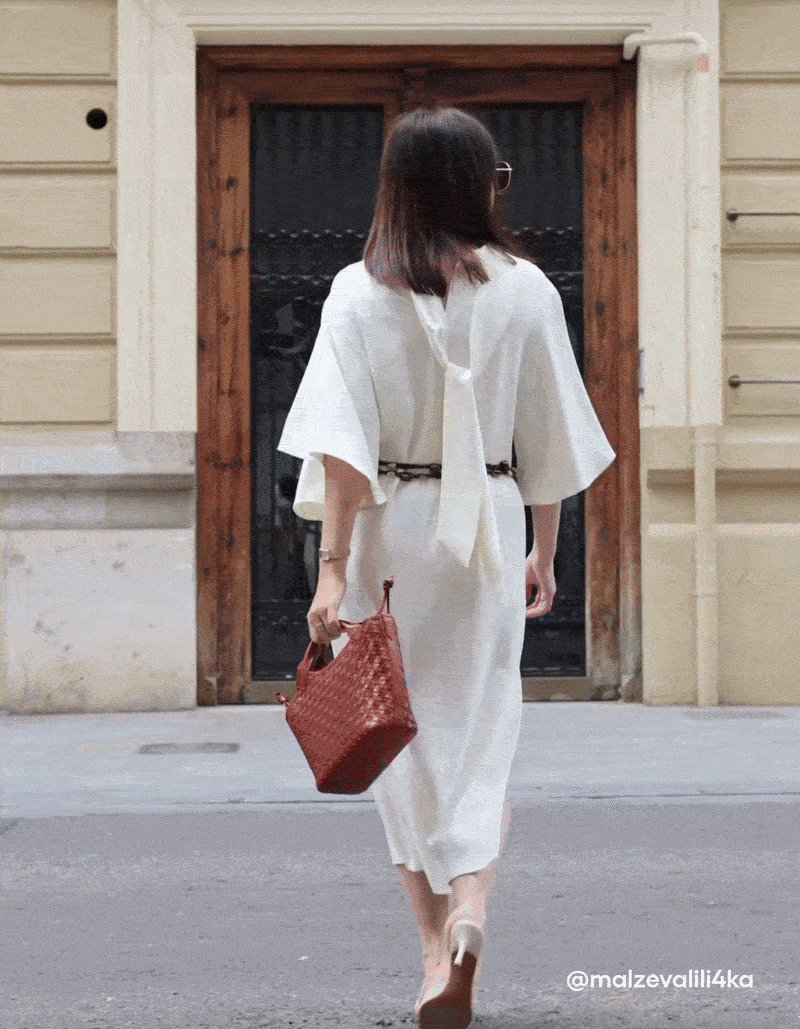 Woman wearing the Mara Midi in Cognac