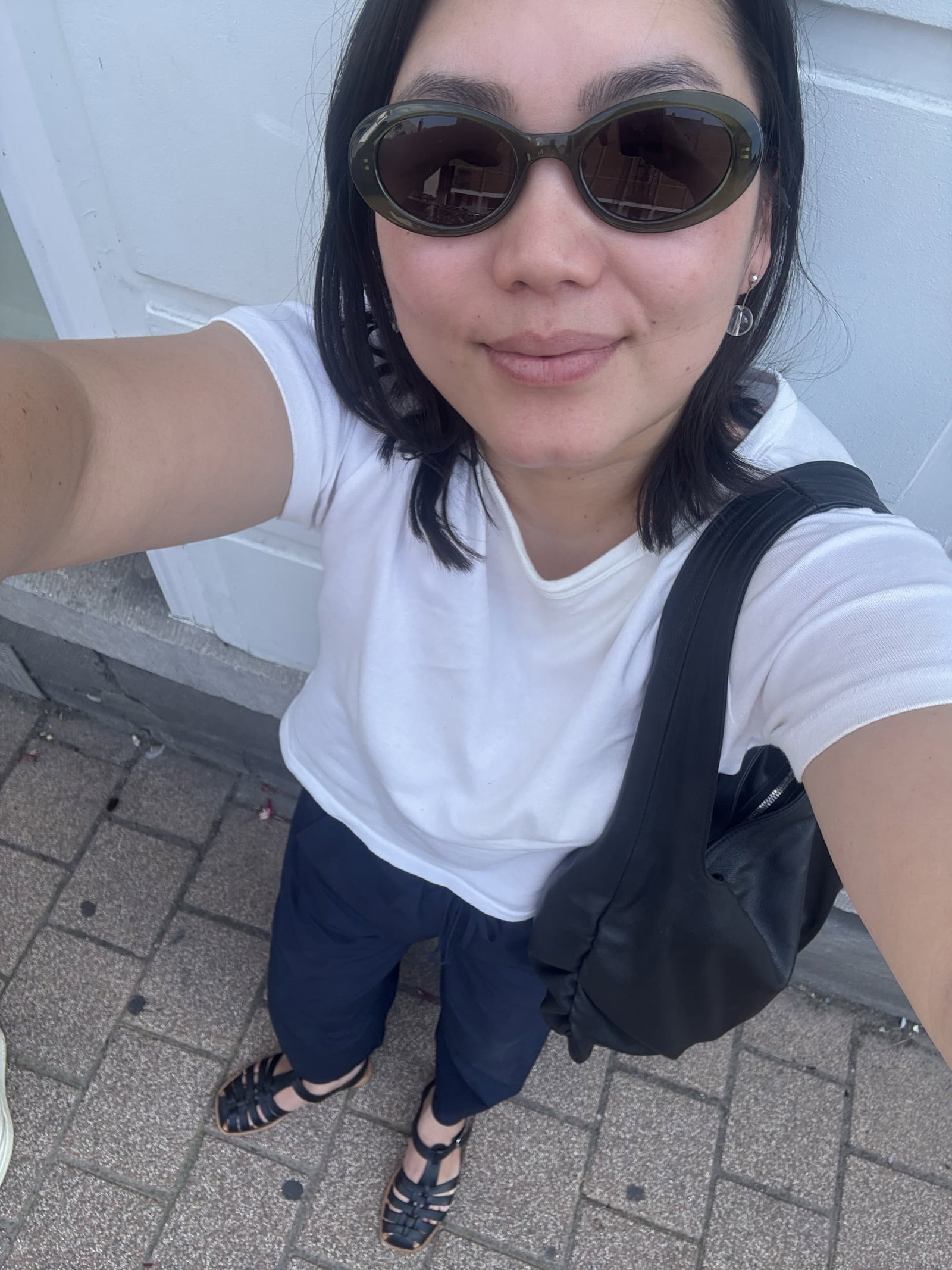 woman wearing black sandals