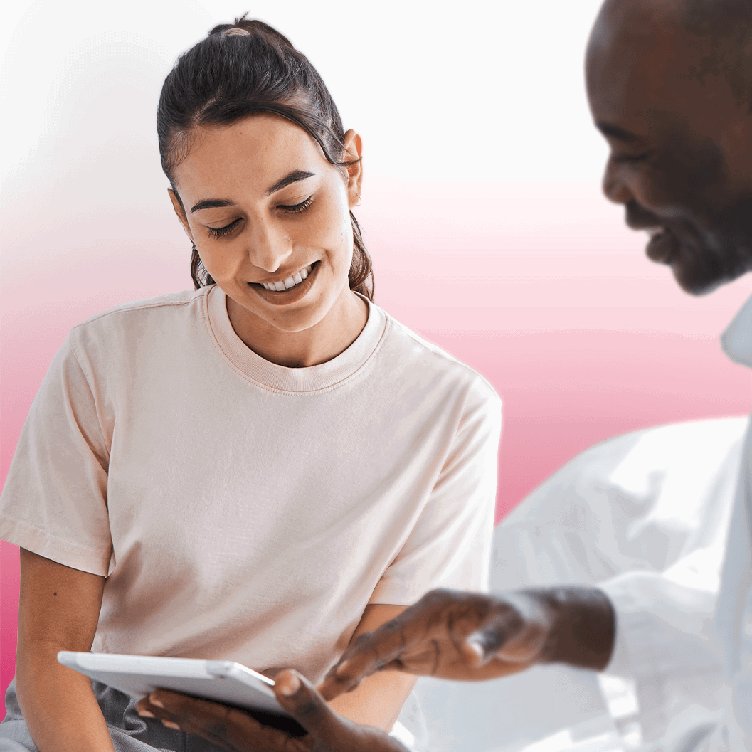 Woman and healthcare provider look at affordable options on MDsave