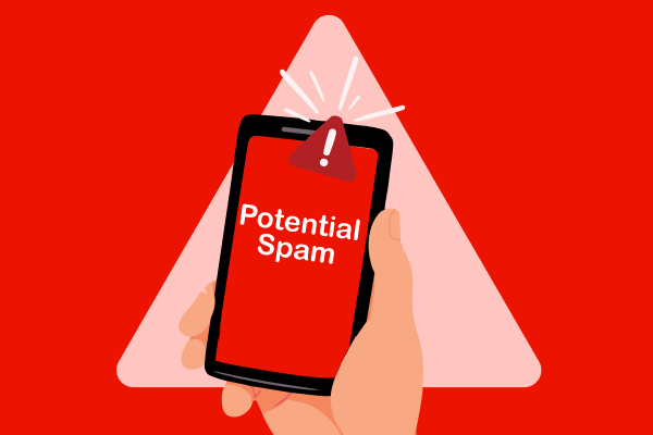 hand holding a phone with Potential Spam on screen
