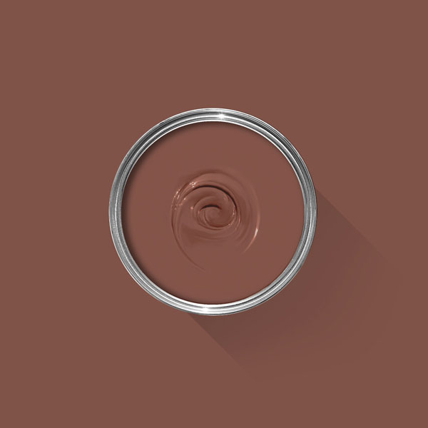 A photo looking down on a Farrow & Ball tin filled with Etruscan Red
