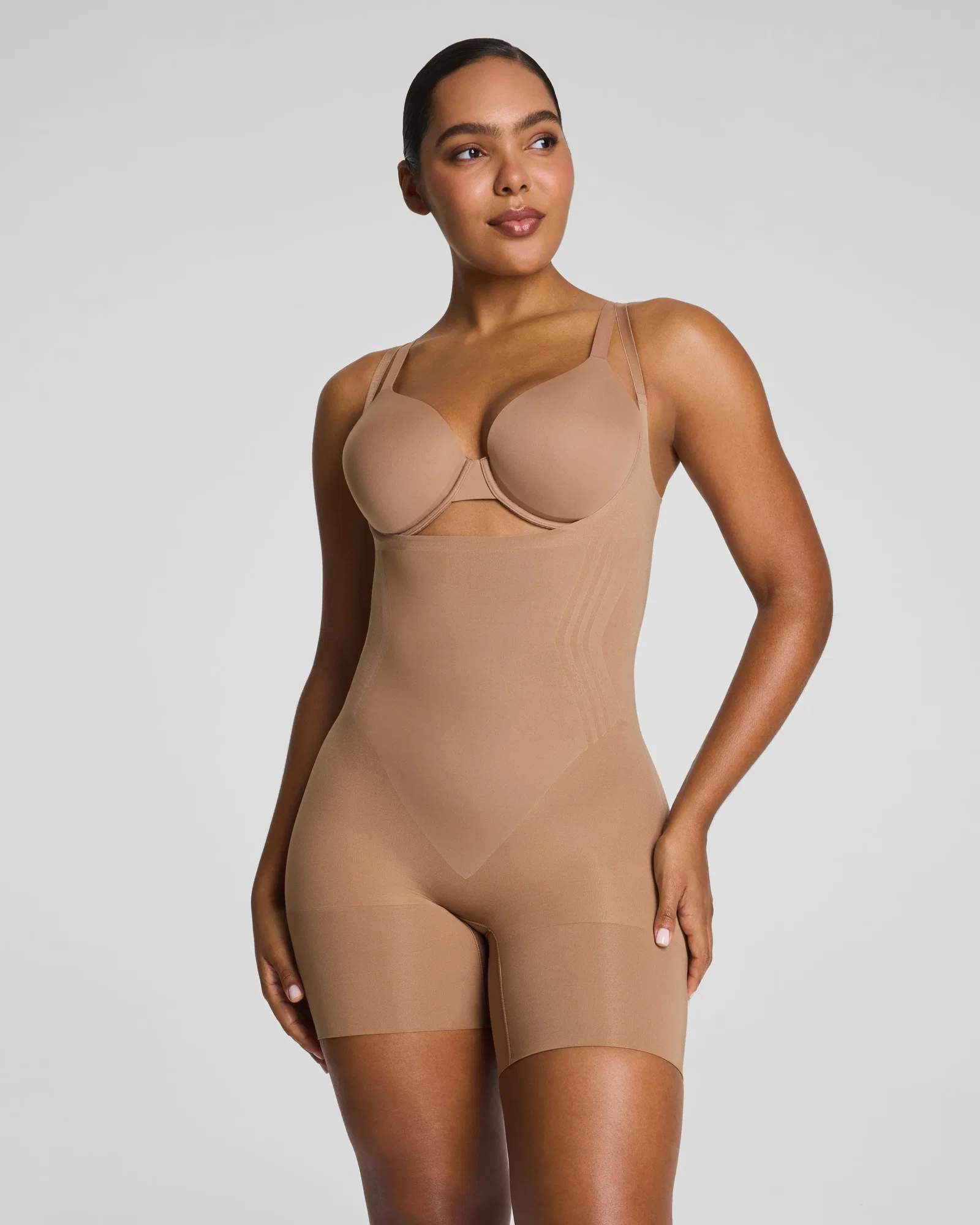 Image of Spanx Women's SPANXsculpt® GoFigure Open-Bust Mid-Thigh Bodysuit in Cinnamon