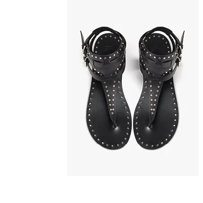 Flat leather sandals with studs